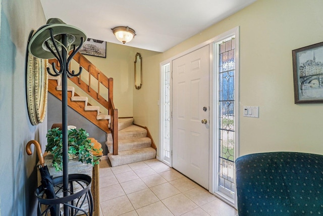 5506 W Chasefield Cir, Mchenry, IL 60050 - foyer featuring stairway and light tile patterned floors