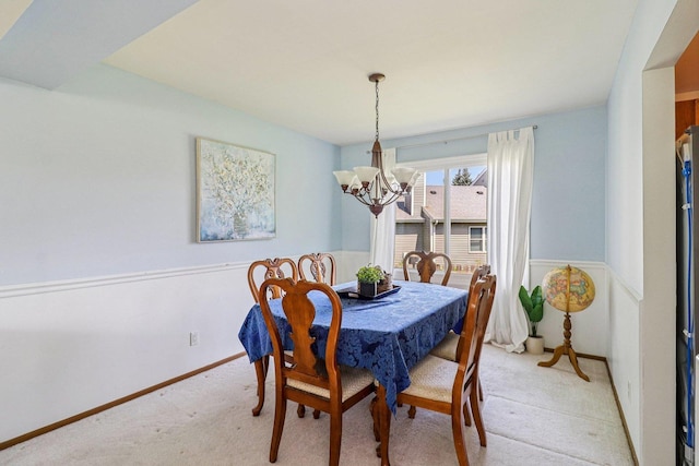 5506 W Chasefield Cir, Mchenry, IL 60050 - dining space featuring a chandelier and light colored carpet