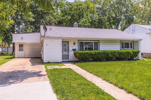 1014 N Main St, Pontiac, IL 61764 - view of front of home with driveway, a chimney, and a shingled roof