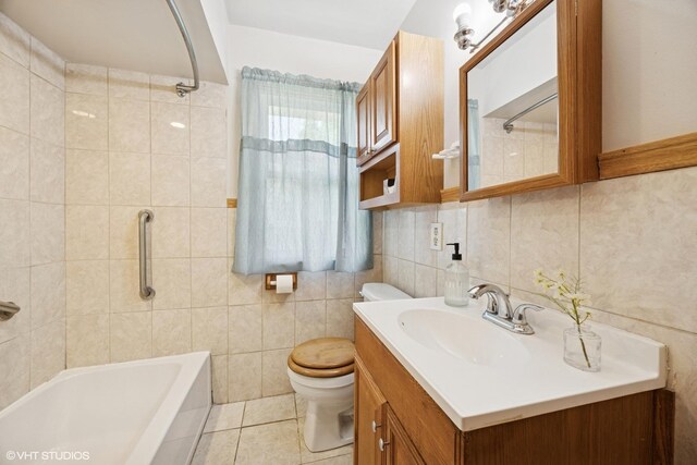 1400 Boeger Ave, Westchester, IL 60154 - full bathroom with vanity, tile walls, tub / shower combination, decorative backsplash, and tile patterned floors