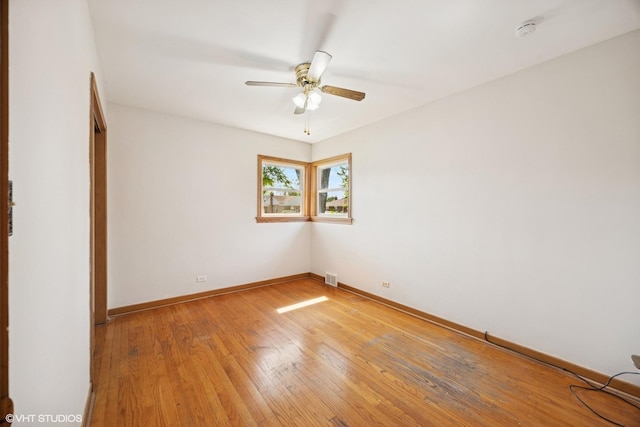 1400 Boeger Ave, Westchester, IL 60154 - unfurnished room with a smoke detector, a ceiling fan, and light wood-style flooring