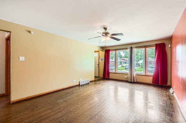 14433 Woodlawn Ave, Dolton, IL 60419 - empty room featuring a ceiling fan and wood finished floors