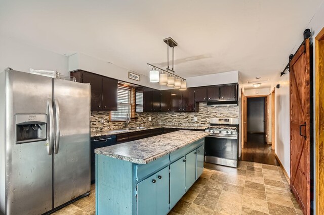 14433 Woodlawn Ave, Dolton, IL 60419 - kitchen with stainless steel appliances, a barn door, tasteful backsplash, and a kitchen island