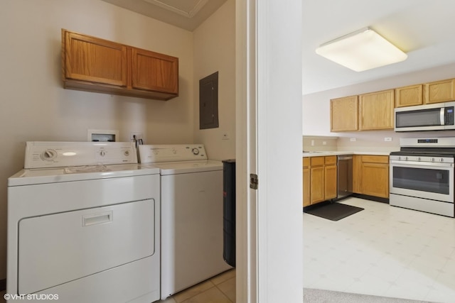 406 Cascade Ln Unit 406, Oswego, IL 60543 - laundry room with washer and dryer, electric panel, and light flooring