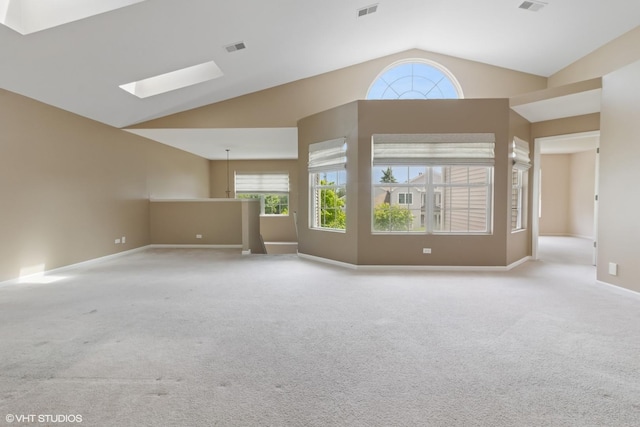 406 Cascade Ln Unit 406, Oswego, IL 60543 - unfurnished room with a skylight, vaulted ceiling, and carpet floors