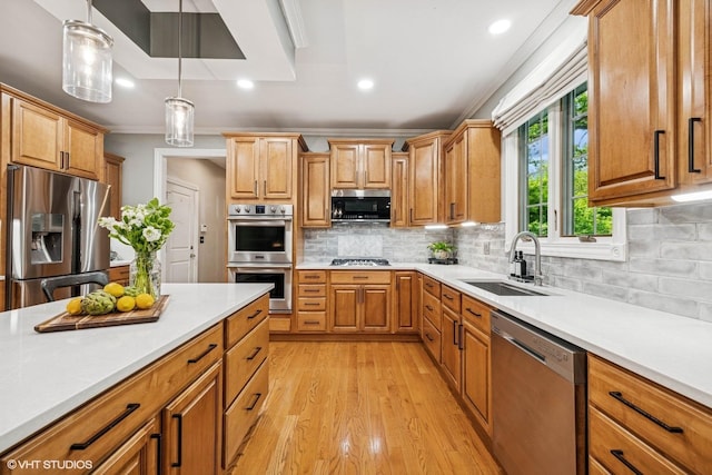 8736 Shade Tree Cir, Lakewood, IL 60014 - kitchen featuring appliances with stainless steel finishes, light wood-type flooring, light countertops, crown molding, and recessed lighting