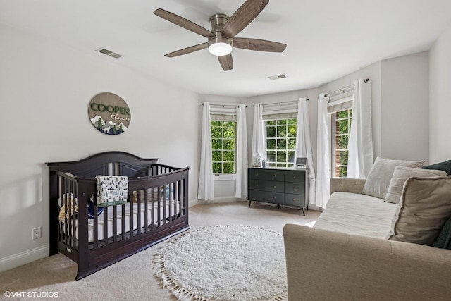 8736 Shade Tree Cir, Lakewood, IL 60014 - carpeted bedroom with baseboards and a ceiling fan