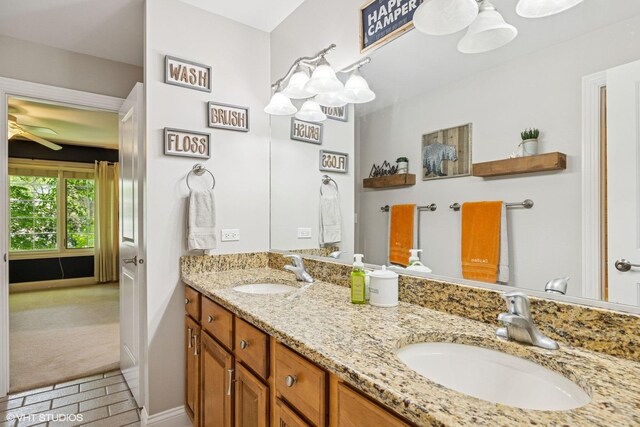 8736 Shade Tree Cir, Lakewood, IL 60014 - bathroom with double vanity, a ceiling fan, and tile patterned floors