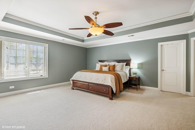 8736 Shade Tree Cir, Lakewood, IL 60014 - bedroom featuring a tray ceiling, ornamental molding, light carpet, and ceiling fan