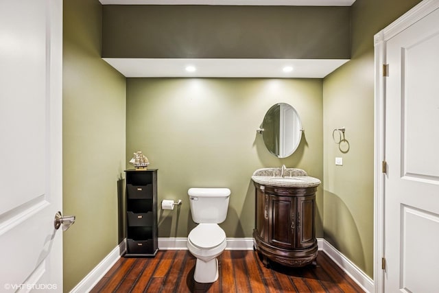 8736 Shade Tree Cir, Lakewood, IL 60014 - bathroom featuring wood finished floors, vanity, and recessed lighting