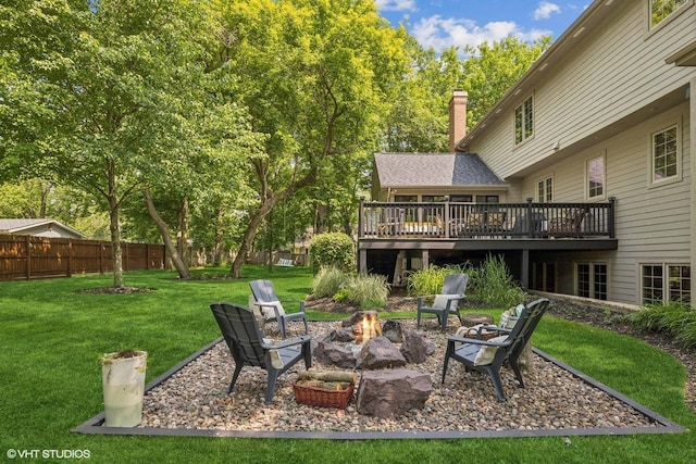 8736 Shade Tree Cir, Lakewood, IL 60014 - view of yard with a wooden deck and a fire pit