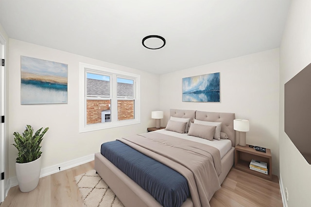 5246 S New England Ave, Chicago, IL 60638 - bedroom with light wood finished floors and baseboards