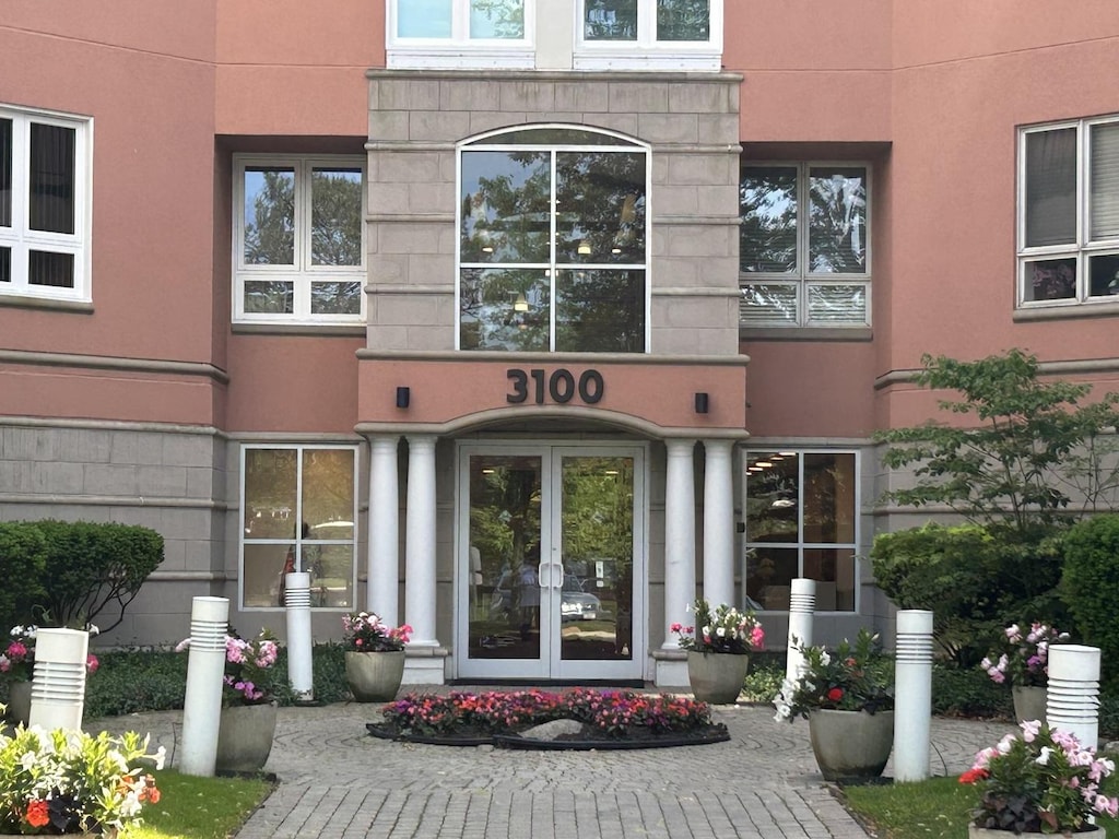 3100 Lexington Ln Unit 306, Glenview, IL 60026 - entrance to property featuring french doors and stucco siding