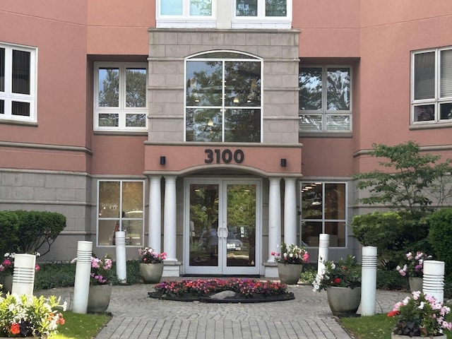 3100 Lexington Ln Unit 306, Glenview, IL 60026 - entrance to property featuring french doors and stucco siding