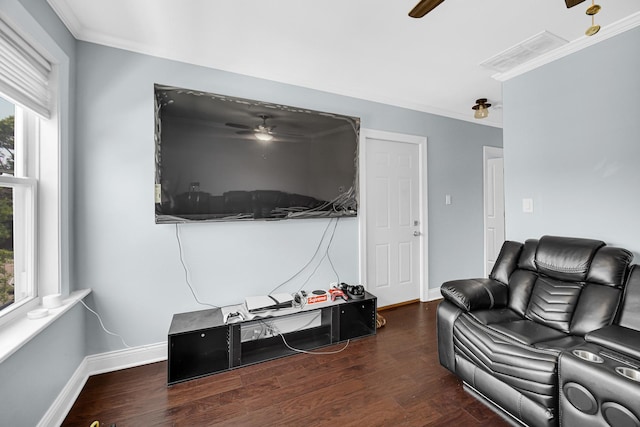 4125 W School St, Chicago, IL 60641 - living area featuring a ceiling fan, crown molding, plenty of natural light, and wood finished floors