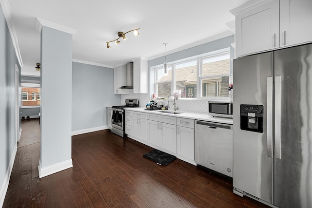 4125 W School St, Chicago, IL 60641 - kitchen featuring stainless steel appliances, crown molding, wall chimney exhaust hood, dark wood-style flooring, and tasteful backsplash
