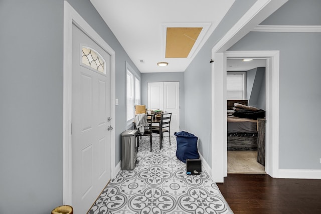 4125 W School St, Chicago, IL 60641 - entryway with baseboards and wood finished floors