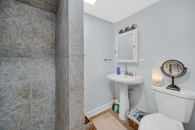 4125 W School St, Chicago, IL 60641 - bathroom with toilet and baseboards
