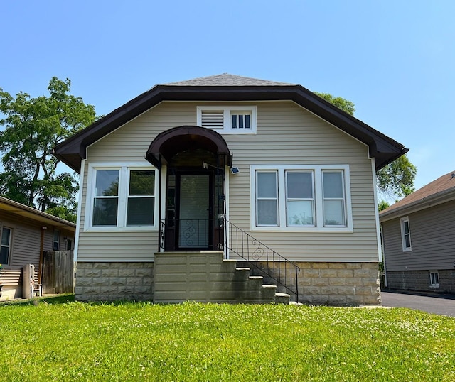 120 S May St, Joliet, IL 60436 - bungalow-style house featuring a front lawn