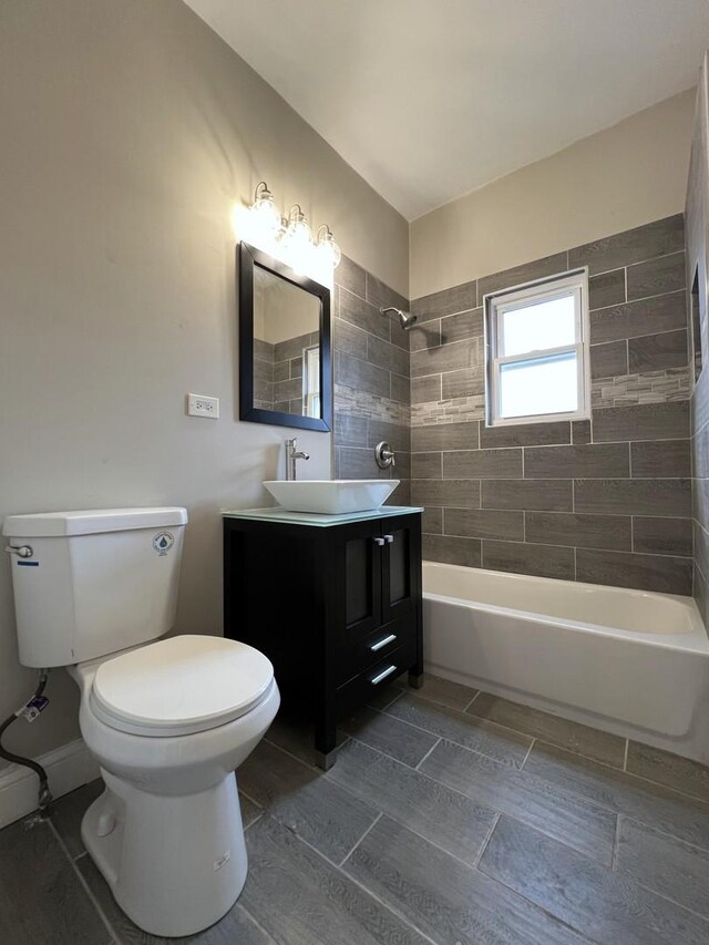 120 S May St, Joliet, IL 60436 - bathroom featuring vanity and shower / tub combination