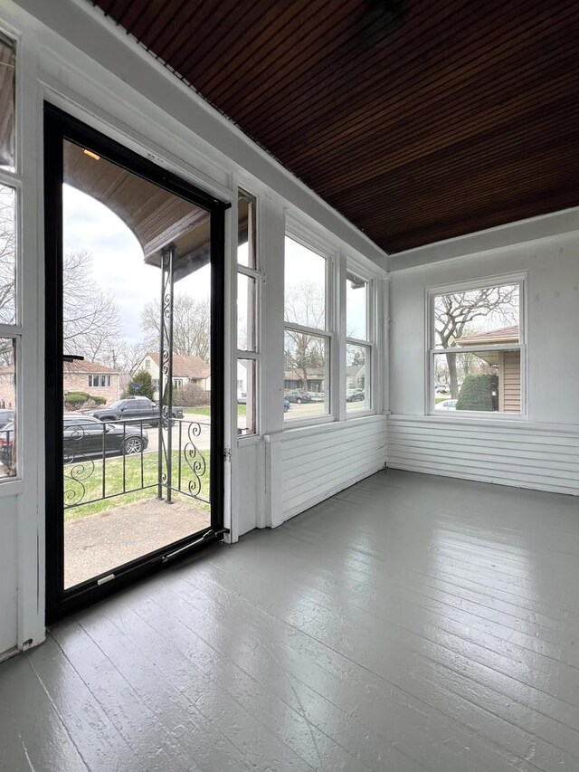 120 S May St, Joliet, IL 60436 - unfurnished sunroom featuring wood ceiling and hardwood / wood-style flooring