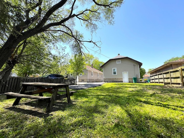 120 S May St, Joliet, IL 60436 - fenced yard featuring a patio
