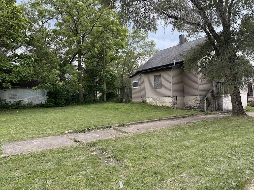 208 E Birch St, Kankakee, IL 60901 - view of grassy yard featuring stairs