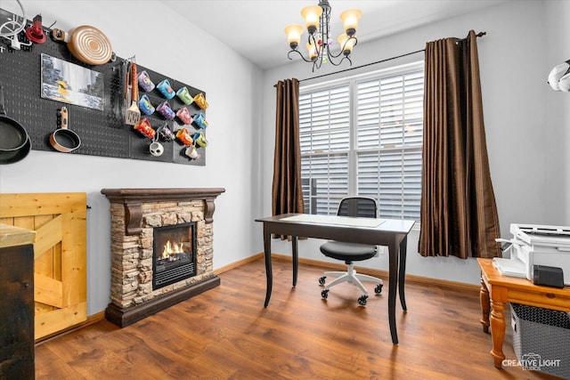 3621 Hyde Park Ct, Elgin, IL 60124 - office space featuring a chandelier, wood finished floors, and a stone fireplace