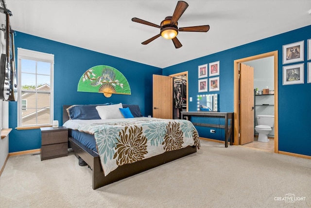 3621 Hyde Park Ct, Elgin, IL 60124 - bedroom featuring carpet, a spacious closet, a closet, ensuite bathroom, and a ceiling fan