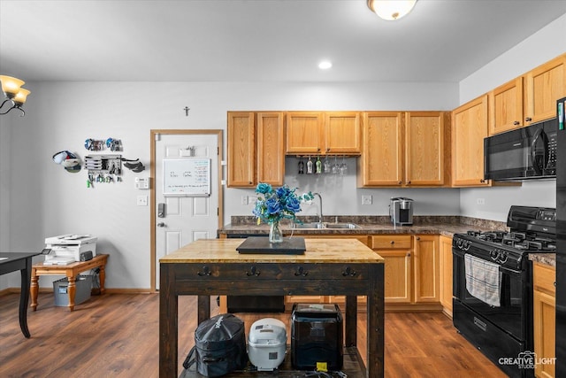 3621 Hyde Park Ct, Elgin, IL 60124 - kitchen with black appliances, dark wood-style flooring, dark countertops, and recessed lighting