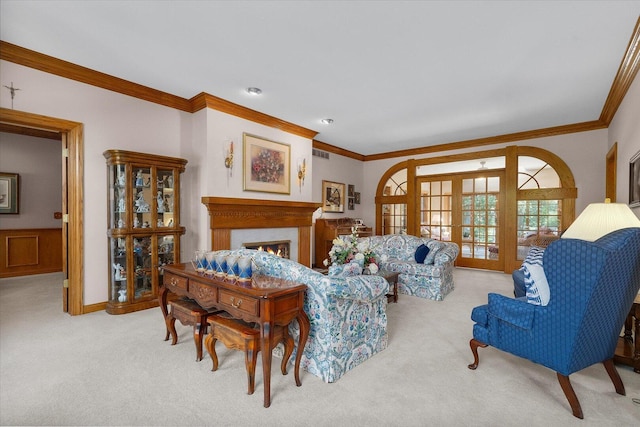 8 Buckingham Dr, Sugar Grove, IL 60554 - living room featuring crown molding, light carpet, french doors, and a premium fireplace