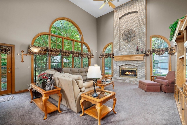 8 Buckingham Dr, Sugar Grove, IL 60554 - living room featuring high vaulted ceiling, carpet flooring, a ceiling fan, and a fireplace