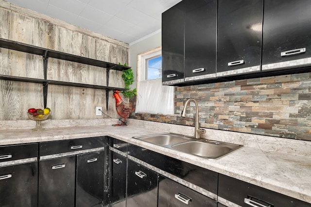 607 E Bridge St, Streator, IL 61364 - kitchen featuring open shelves, dark cabinetry, decorative backsplash, light countertops, and crown molding
