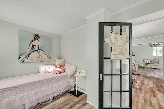 607 E Bridge St, Streator, IL 61364 - bedroom with ornamental molding and wood finished floors