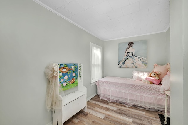 607 E Bridge St, Streator, IL 61364 - bedroom featuring crown molding and wood finished floors