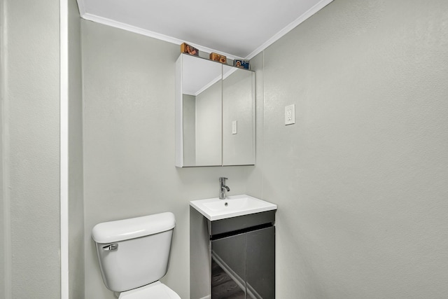 607 E Bridge St, Streator, IL 61364 - half bathroom with vanity and ornamental molding