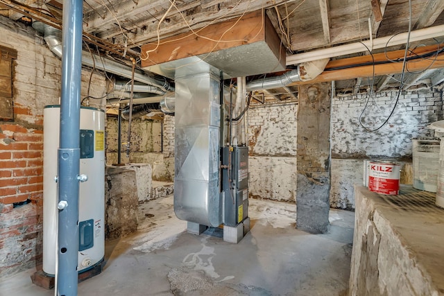 607 E Bridge St, Streator, IL 61364 - unfinished basement with electric water heater and heating unit