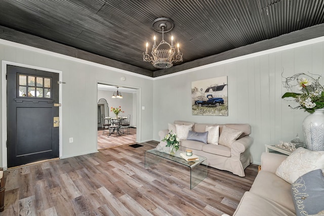 607 E Bridge St, Streator, IL 61364 - living room with a chandelier and wood finished floors