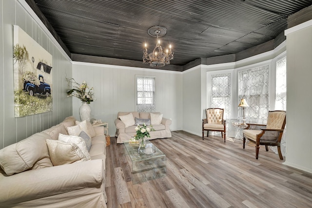 607 E Bridge St, Streator, IL 61364 - living area with a chandelier and wood finished floors