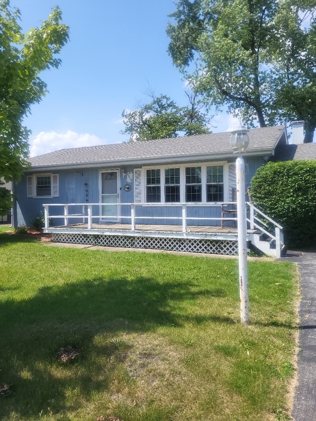 7710 W 81st Pl, Bridgeview, IL 60455 - ranch-style house with a front yard