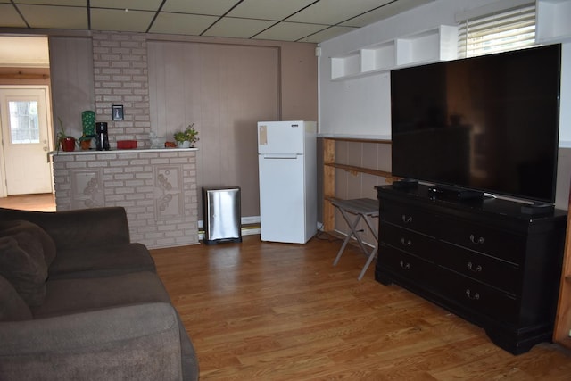 7710 W 81st Pl, Bridgeview, IL 60455 - living area featuring a drop ceiling and light wood-style floors