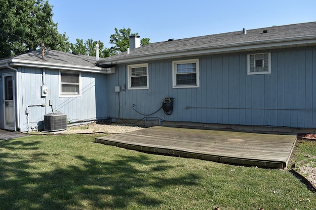 7710 W 81st Pl, Bridgeview, IL 60455 - back of house featuring a chimney, a deck, and a yard