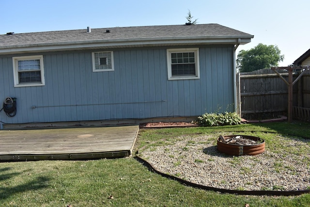 7710 W 81st Pl, Bridgeview, IL 60455 - view of side of property with a deck and a shingled roof