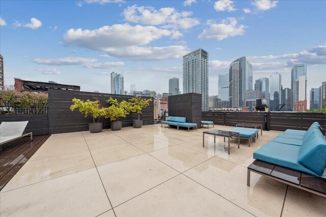 411 W Ontario St Unit 411, Chicago, IL 60654 - view of patio featuring a view of skyline