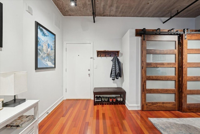 411 W Ontario St Unit 411, Chicago, IL 60654 - entryway featuring wood finished floors and a barn door