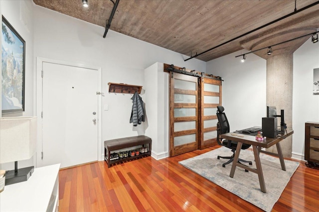 411 W Ontario St Unit 411, Chicago, IL 60654 - office area with track lighting, wood finished floors, and a barn door