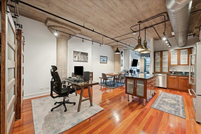 411 W Ontario St Unit 411, Chicago, IL 60654 - office area with light wood-type flooring and track lighting