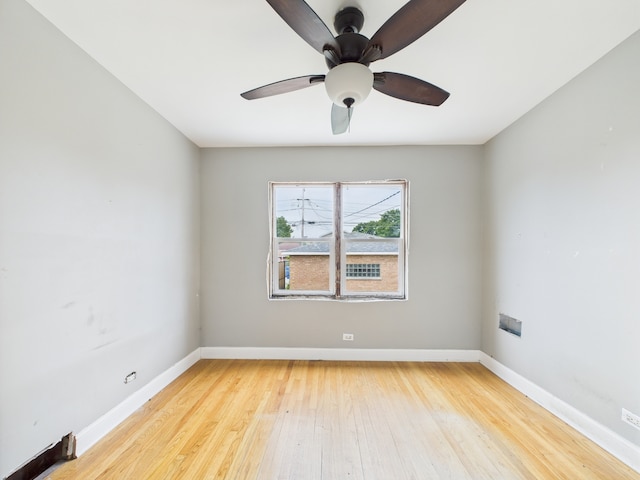 3810 W 71st St, Chicago, IL 60629 - empty room with light wood-type flooring and ceiling fan