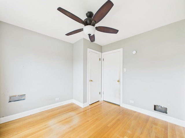3810 W 71st St, Chicago, IL 60629 - unfurnished room featuring ceiling fan and light wood-style flooring