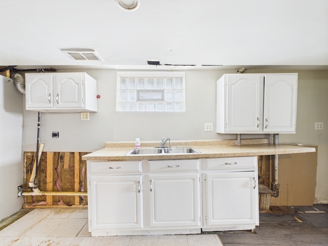3810 W 71st St, Chicago, IL 60629 - kitchen with white cabinets and light countertops